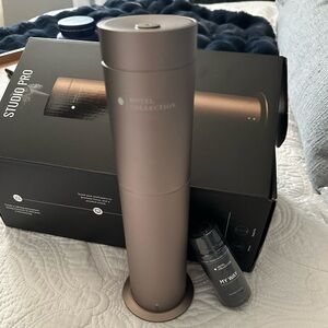 Studio Pro Diffuser in rose color w/pro-pod scent in CHANDELIER. You get both